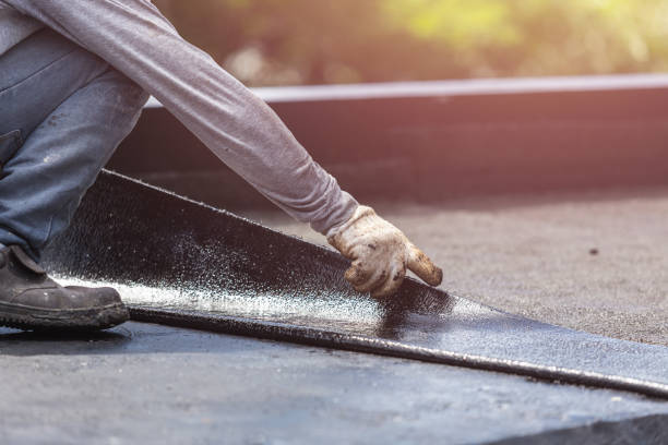 Professional Waterproofing technician working in Oswego, NY